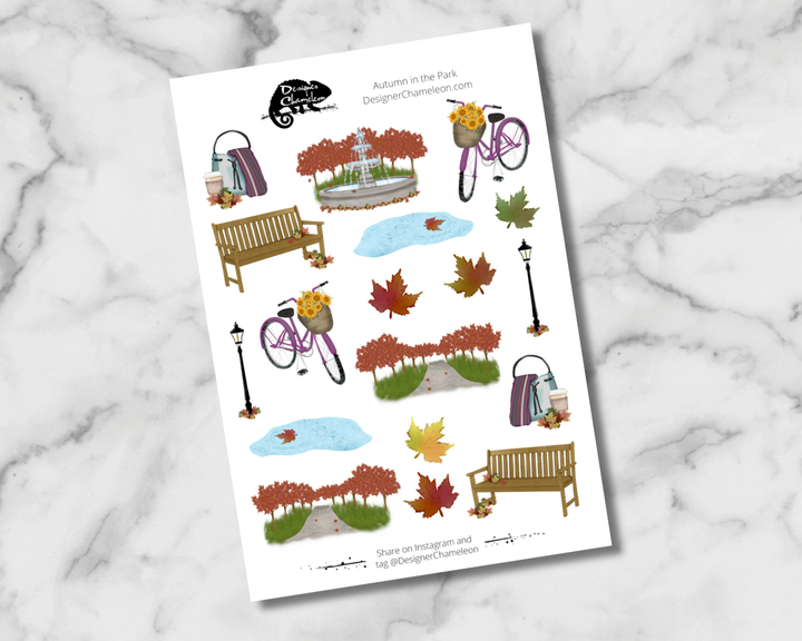 Autumn in the Park Main Artwork sheet with benches, bicycles, tree-lined paths, ponds, lampposts, bags and colorful fallen leaves.